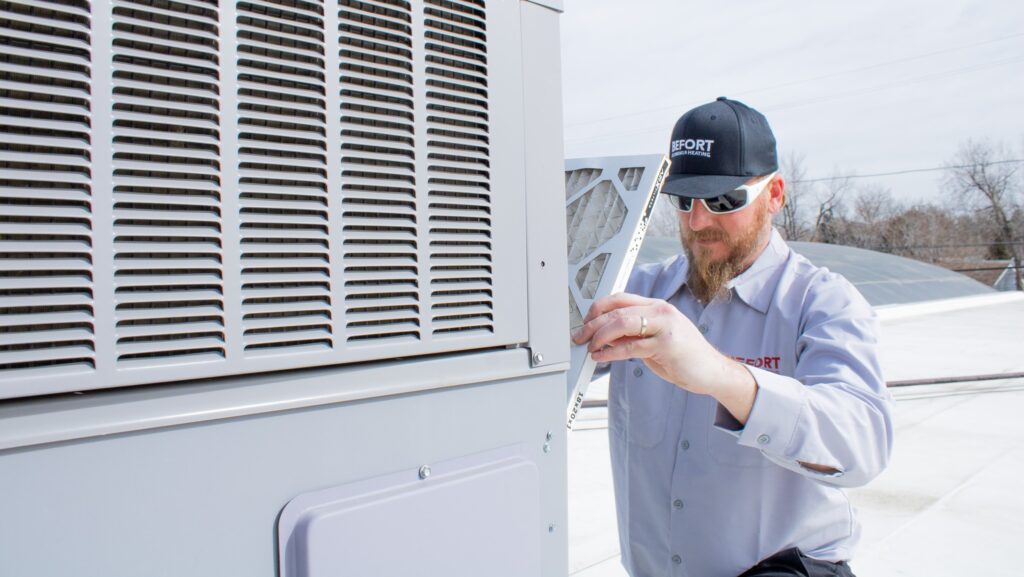 HVAC Tech working on AC