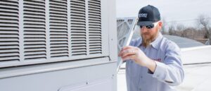 HVAC Tech working on AC
