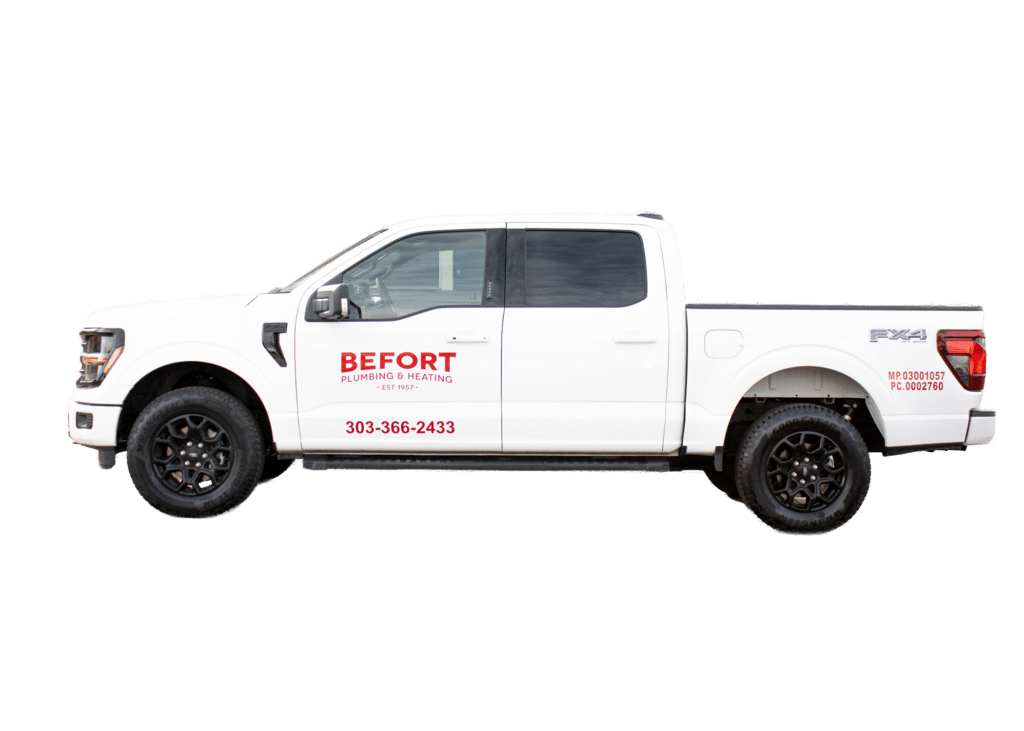 A Befort Plumbing * Heating Work Truck Puls Up to a Job